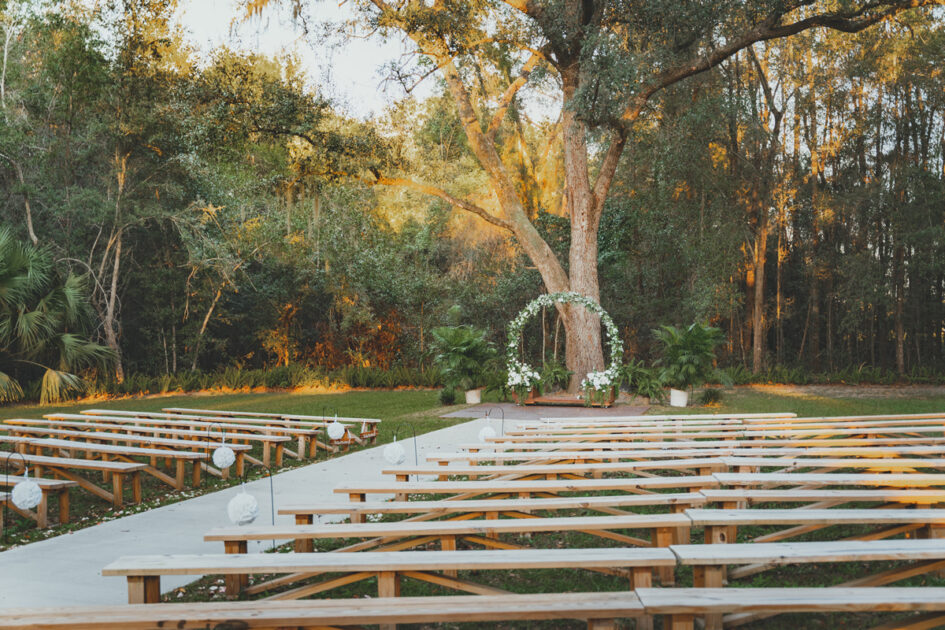 An outdoor seating area set for a wedding